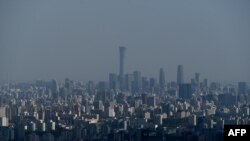 Вигляд на центральний район Пекіна, 30 квітня 2023 р. Китай вкладає мільярди доларів у зусилля, спрямовані на зміну глобального інформаційного середовища. WANG Zhao/AFP
