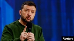 Ukraine's President Volodymyr Zelenskyy speaks during 'Ukraine. Year 2024' conference, amid Russia's attack on Ukraine, in Kyiv, Feb. 25, 2024. 