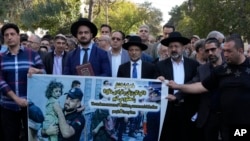 FILE - Iranian Jews attend a gathering to condemn Israel's attacks on Gaza in Tehran, Iran, Oct. 30, 2023.