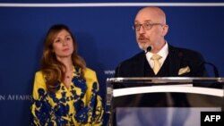 Ukrainian Defense Minister Oleksii Reznikov speaks next to Ukrainian Deputy Foreign Minister Emine Dzhaparova at the Black Sea Security Conference under the auspices of Crimea International Platform in Bucharest, Apr. 13, 2023.