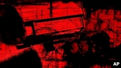 This image provided March 23, 2023, by Patrick Amadon, shows part of his "No Rioters" digital artwork. The US-based artist said his installation that showed solidarity with Hong Kong protesters was taken down due to legal concerns.