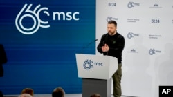 FILE - Ukrainian President Volodymyr Zelenskyy speaks at the Munich Security Conference, in Munich, Feb. 17, 2024.