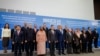 FILE - Officials pose for a group photo during a meeting of the BRICS Plus Ministerial Council in the city of Nizhny Novgorod, Russia, June 11, 2024.