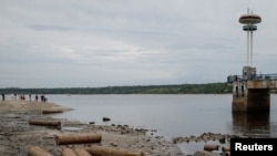 A general view of a city beach covered with rubbish, after a water level in the Dnipro river sharply dropped following Kakhovka dam destruction, in Zaporizhzhia, Ukraine, June 10, 2023.