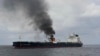 FILE - In this photo provided by the Indian Navy on Jan. 27, 2024, a view of the oil tanker Marlin Luanda burns after an attack in the Gulf of Aden. The Marshall Islands-flagged tanker was hit by a missile launched by Yemen’s Houthi rebels.