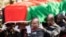 FILE - Pallbearers carry the coffin at the burial service for Malawi's Vice President Saulos Chilima in Nsipe, Malawi, June 17, 2024. 