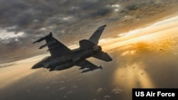 FILE - An F-16 is flown during a mission at Eglin Air Force Base, Florida, Feb. 14, 2019.