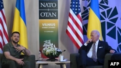 U.S. President Joe Biden, right, attends a meeting with Ukrainian President Volodymyr Zelenskyy at the sidelines of the NATO Summit in Vilnius on July 12, 2023.