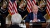 U.S. President Joe Biden attends a meeting with the President's Council of Advisors on Science and Technology in the State Dining Room of the White House, April 4, 2023, in Washington.