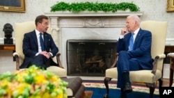 President Joe Biden, right, meets with Swedish Prime Minister Ulf Kristersson in the Oval Office of the White House, in Washington, July 5, 2023.