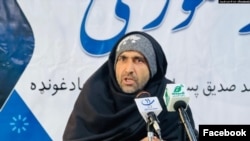 Izatullah Zawab is seen at a cultural gathering in Kabul, Afghanistan, in this undated photo posted to his Facebook page.