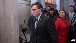 House Speaker Mike Johnson enters the House chamber as lawmakers prepared to vote on the articles of impeachment against Homeland Security Secretary Alejandro Mayorkas at the Capitol in Washington, Feb. 6, 2024. The vote failed.
