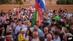 VOX far right party leader Santiago Abascal (front center right) poses with supporters during an election campaign event in Guadalajara, Spain, July 15, 2023.