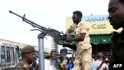 Sudanese security forces patrol in a commercial district in Gedaref city in eastern Sudan on April 3, 2024.