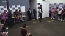 US voters mixed on Biden staying in race 