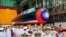 Navy personnel are pictured with Taiwan's first domestically made submarine during the launching ceremony at CSBC Corp.'s shipyards in Kaohsiung, Taiwan, Sept. 28, 2023.