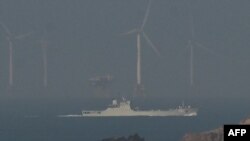 A Chinese landing ship sails towards the zone where China said it would conduct live fire exercises northeast of Pingtan island, the closest point in China to Taiwan, in China's southeast Fujian province on April 10, 2023.