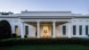 FILE - The White House West Wing entrance as seen early in the morning in Washington, Oct. 17, 2020. President Joe Biden will host Japanese Prime Minister Fumio Kishida and Philippines President Ferdinand Marcos Jr. in a White House summit on Thursday. 