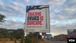 A billboard warns of the dangers of drug use, in Harare, Zimbabwe, June 25, 2024. (Columbus Mavhunga/VOA)