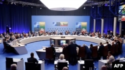 This general view shows a working session on Ukraine during the NATO summit, in Vilnius on July 12, 2023.