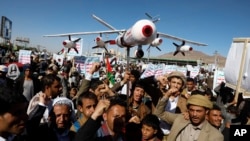 Houthi supporters attend a rally against the U.S.-led strikes on Yemen and Israel's war in Gaza Strip, in Sanaa, Yemen, Feb. 23, 2024. 