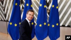 Sweden's Prime Minister Ulf Kristersson arrives for an EU summit in Brussels, Belgium, Feb. 1, 2024. Kristersson will visit Hungarian Prime Minister Viktor Orban in Budapest on Feb. 23.