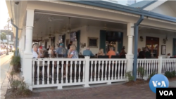 People at The Villages at an establishment at one of the retirement community's town squares, Feb. 27, 2023.