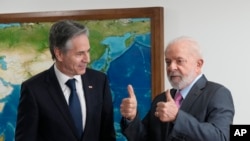Brazil's President Luiz Inacio Lula da Silva, right, is seen with U.S. Secretary of State Antony Blinken during a meeting at Planalto presidential palace, in Brasilia, Brazil, Feb. 21, 2024.