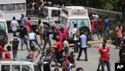 Demonstrators fill the streets during a protest to demand the resignation of Prime Minister Ariel Henry, in Port-au-Prince, Haiti, July 20, 2023. 