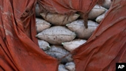 Bags of charcoal are visible on a truck in Gulu, Uganda, May 28, 2023.