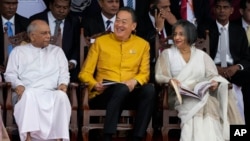 Thai Prime Minister Srettha Thavisin, center, sits with Sri Lankan Prime Minister Dinesh Gunawaradane, left, and Sri Lankan first lady Maithree Wickremesinghe, during Sri Lanka's 76th Independence Day celebrations, in Colombo, Feb. 4, 2024.