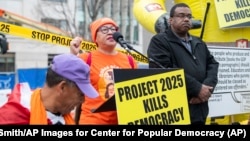 FILE - Clara Cortes talks about Project 2025 during a rally called "No Day One Dictator! Stop Project 2025!" in Washington, Jan. 27, 2024. (Joy Asico-Smith/AP Images for Center for Popular Democracy)