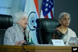 U.S. Treasury Secretary Janet Yellen, left and Finance Minister of India Nirmala Sitharaman address media during G-20's third Finance Ministers and Central Bank Governors (FMCBGs) meeting in Gandhinagar, India, July 17, 2023.