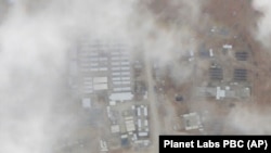 FILE — A satellite photo from Planet Labs PBC shows a military base known as Tower 22 in northeastern Jordan, Jan. 29, 2024. (Planet Labs PBC via AP)