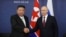 FILE - Russian President Vladimir Putin, right, and North Korea's leader Kim Jong Un shake hands during their meeting at the Vostochny cosmodrome outside the city of Tsiolkovsky, Russia, on Sept. 13, 2023. 