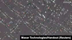 In Photos: Ukrainians Flee Flood Following Destruction of Kakhovka Dam