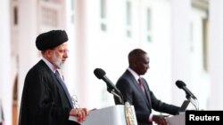 Iran's President Ebrahim Raisi attends a joint press conference with Kenya's President William Ruto at the State House in Nairobi, Kenya, July 12, 2023. Iran's Presidency/WANA (West Asia News Agency)/Handout via Reuters 