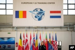 Netherland's Defense Minister Kajsa Ollongren speaks during the inauguration of a F-16 jet pilot training hub at the Baza 86 military air base, outside Fetesti, Romania, Nov. 13, 2023.