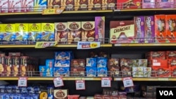 Indian cookies are seen at Shwapno Super Store in Kumilla, Bangladesh, Feb. 20, 2024. Many Indian products have been sold at heavily discounted prices in recent weeks in Bangladesh since the India Out campaign was launched. (A. Shaikat for VOA)