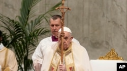 Pope Francis presides over a Mass for the religious orders in St. Peter's Basilica at the Vatican, Feb. 2, 2024. 