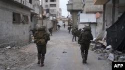 This handout picture released by the Israeli army on Feb. 16, 2024 shows troops on the ground in the Gaza Strip amid ongoing battles between Israel and the Palestinian militant group Hamas. (Photo by Israeli Army/AFP)