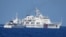 FILE - A Chinese Coast Guard ship allegedly obstructs a Philippine Coast Guard vessel as it provided support during a Philippine Navy operation in the disputed South China Sea, June 30, 2023 in this handout image released July 5, 2023.