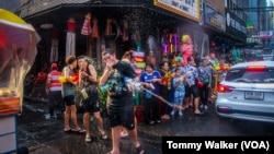 Locals celebrate the Sonkran water festival in Bangkok, Thailand, April 13, 2024.