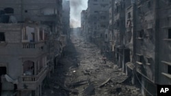 FILE - A view of the rubble of buildings hit by an Israeli airstrike, in Jabalia, Gaza Strip, on Oct. 11, 2023.
