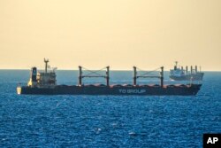 FILE - A bulk grain cargo ship is anchored in the Black Sea near the entrance of the Bosphorus Strait in Istanbul, Turkey, July 17, 2023.