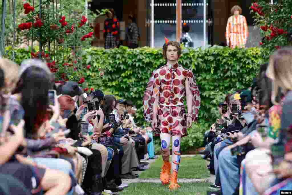 A model presents a creation by designer Walter Van Beirendonck as part of his Menswear ready-to-wear Spring Summer 2025 collection show during Men&#39;s Fashion Week in Paris, France.