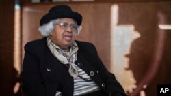 FILE - Esther Lee, president of the Bethlehem Chapter of the NAACP, talks about the presidential election in Bethlehem, Pa., Jan. 17, 2024.