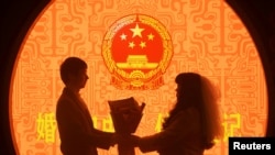 རྒྱ་ནག་ཏུ་གཉེན་སྒྲིག་བྱེད་མཁན་ཉུང་དུ་སོང་།