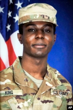 This portrait of American soldier Travis King is displayed at the home of his grandfather Carl Gates, July 19, 2023, in Kenosha, Wis.