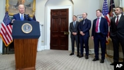 President Joe Biden speaks about artificial intelligence in the Roosevelt Room of the White House, July 21, 2023, in Washington, accompanied by leaders of companies building AI products.
